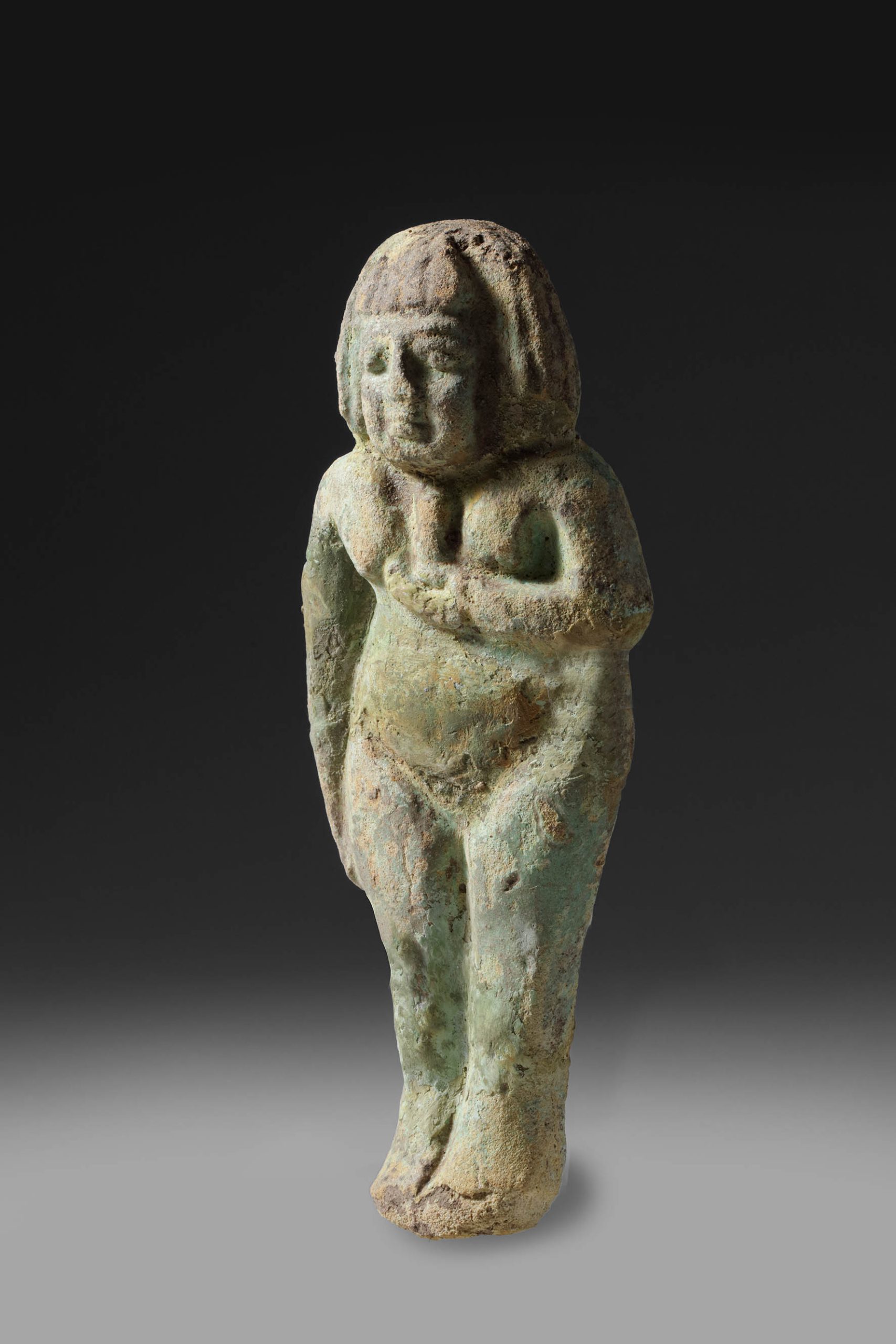 BLUE GREEN FAIENCE FIGURE OF A CONCUBINE