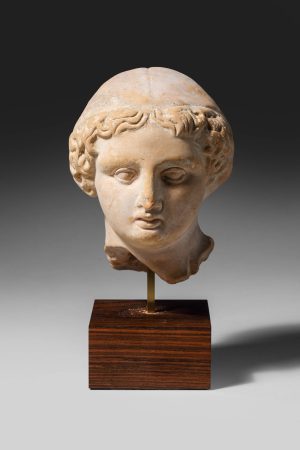 TERRACOTTA HEAD OF YOUNG GIRL