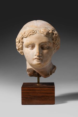 TERRACOTTA HEAD OF YOUNG GIRL