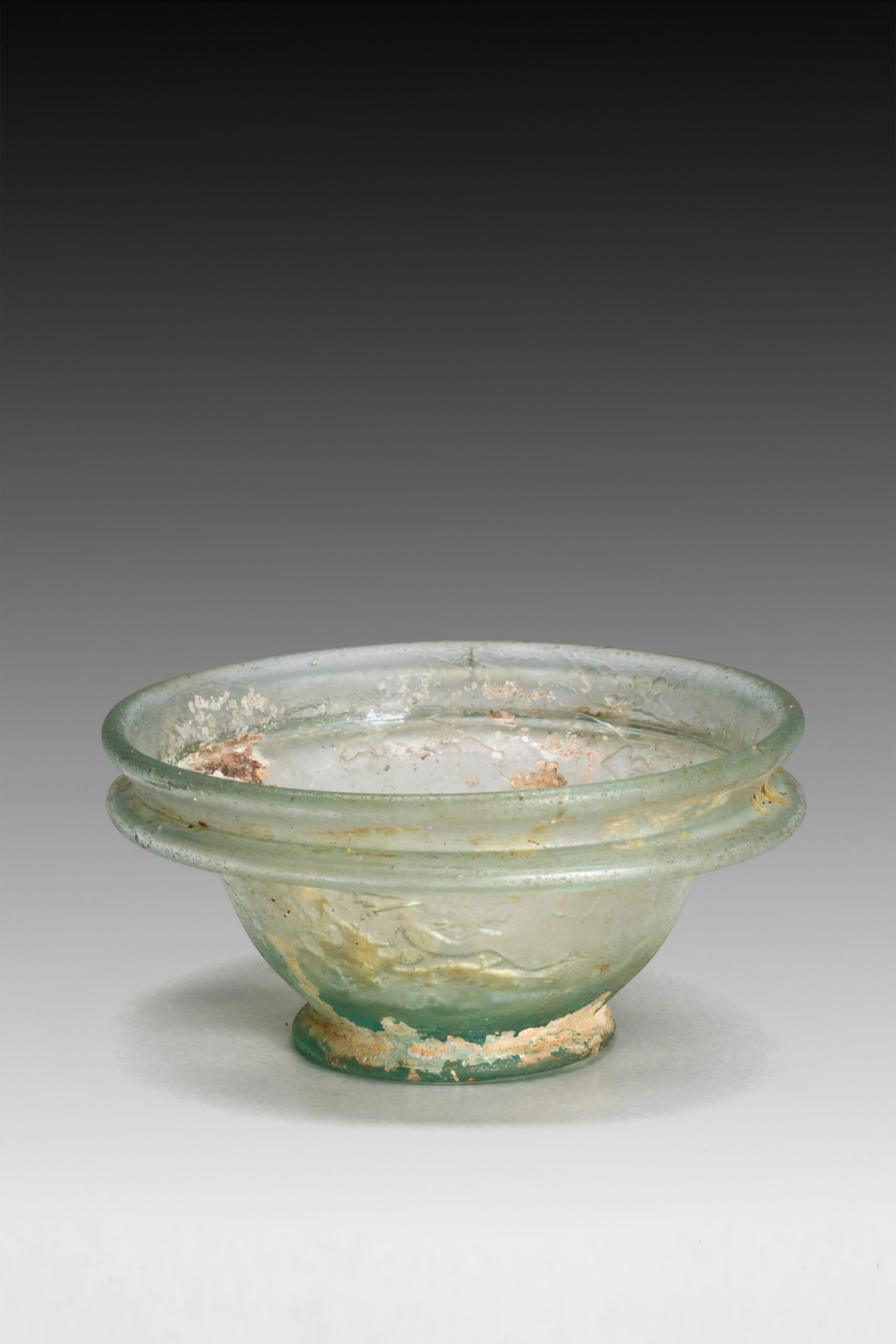 roman green glass cup or acetabulum